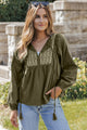 Ample pleated blouse with split and green spokes