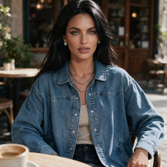 Veste longue en jean bleu à col chemise et boutons-pression