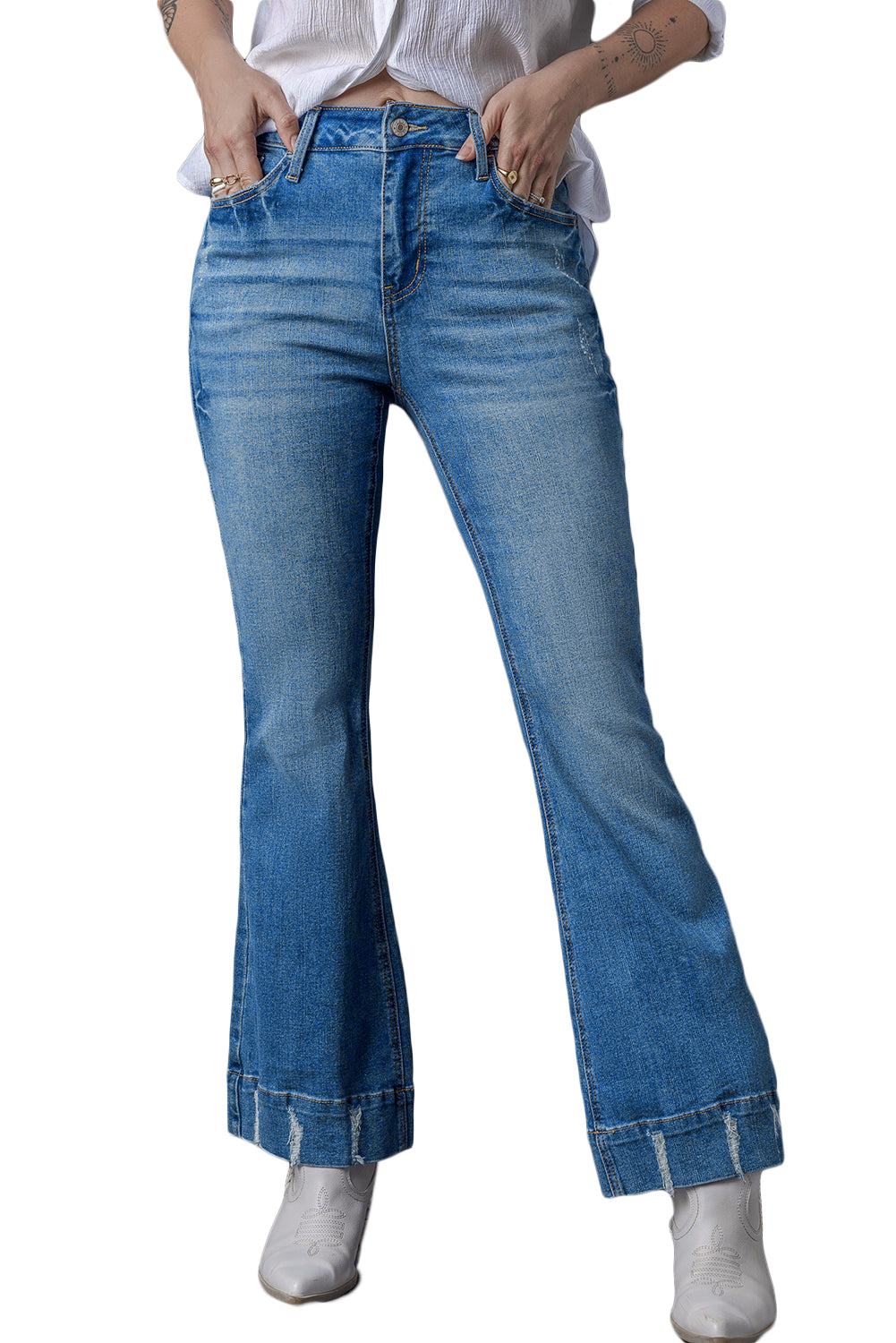 Jeans bagliore di lavaggio medio lieve blu lieve