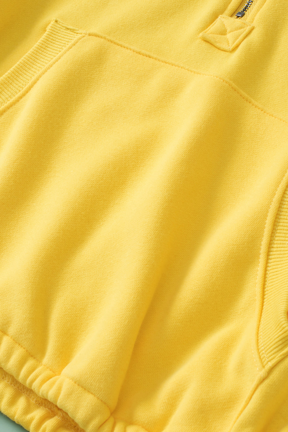 Trime à côte jaune Kangaroo Pocket à sweat à sweat zippé