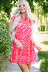 Pink dress with pockets and ruffle border printed with zero stripes