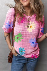 Camiseta con estampados florales rosa hinchado