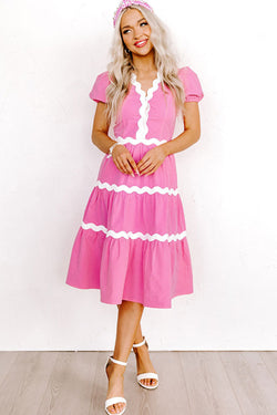 Mid-length fluid dress with short puffing sleeves and candy ric rac border