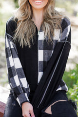 Black checkerboard patchwork collared top with exposed seams