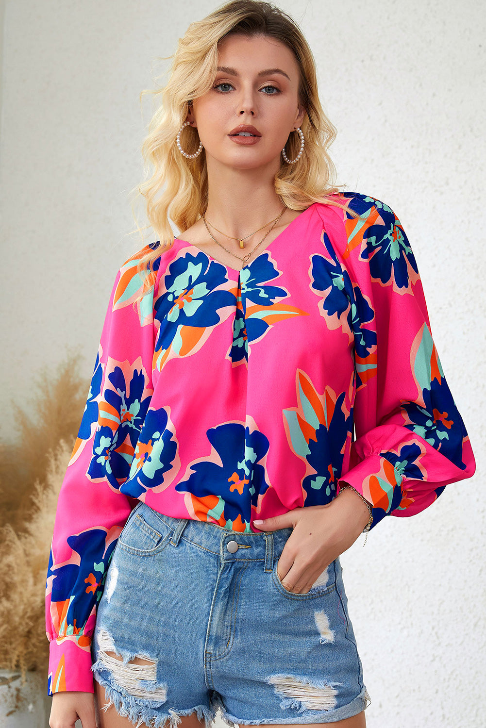 Blouse à manches bouffantes et imprimé fleurs roses