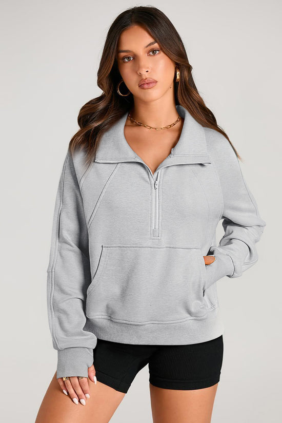 Light gray sweatshirt with stand-up collar and kangaroo pocket with quarter-turn zip