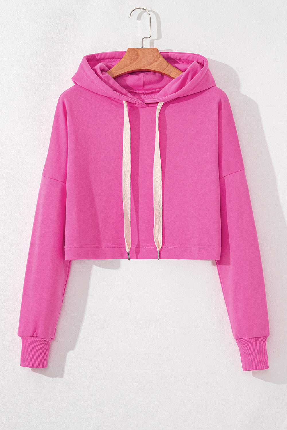 Sweat à capuche court à cordon de serrage uni rose *