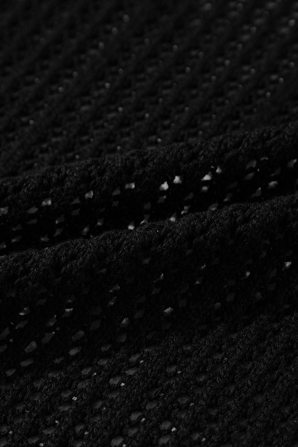 Crochet noir creux de cardigan ouvert ouvert