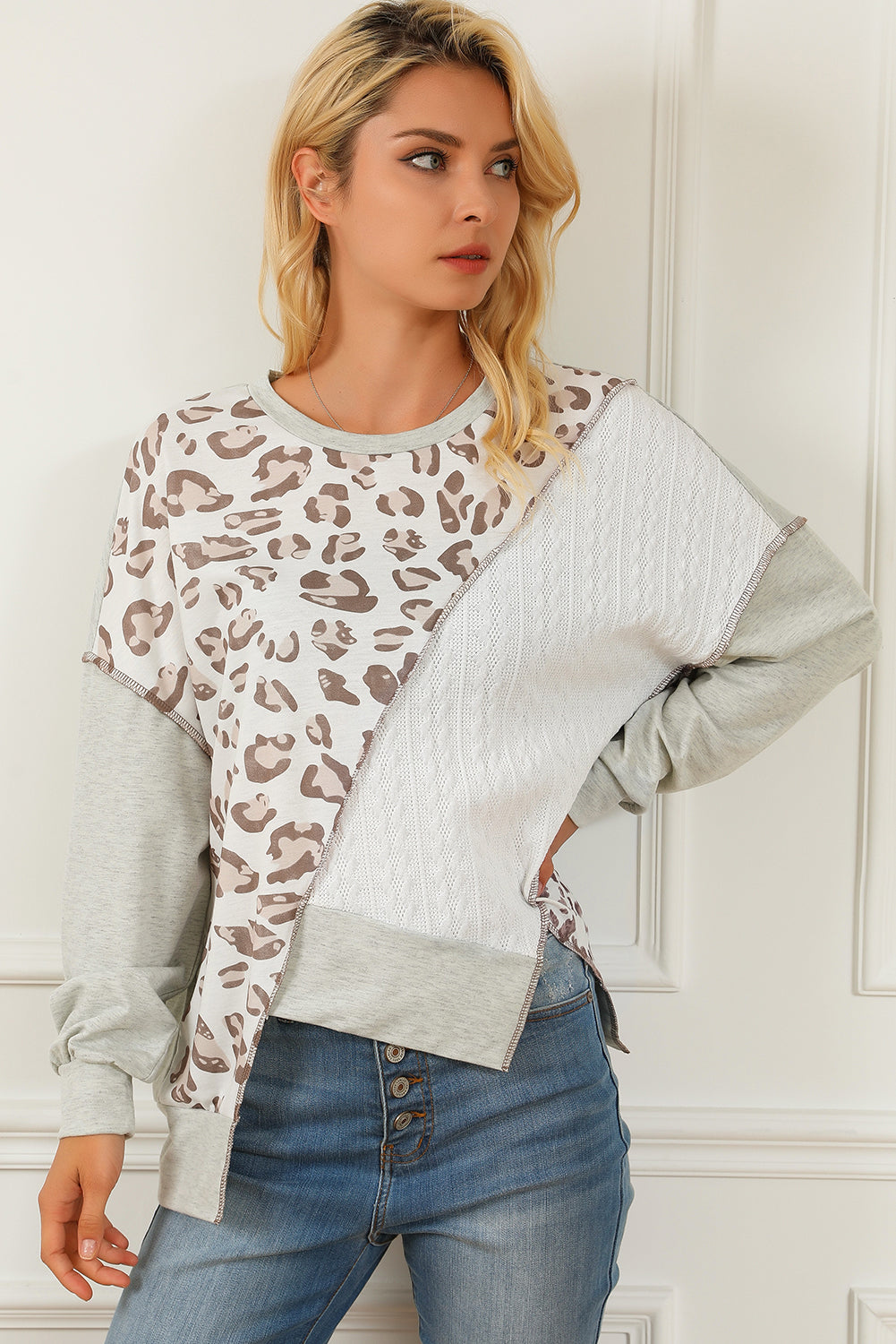 Sudadera suelta asimétrica con textura de leopardo