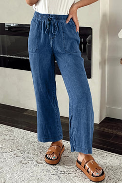 Large right denim pants with tightening cord and blue mineral washing