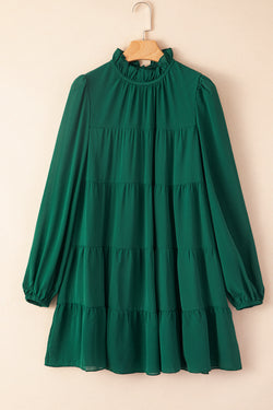 Green dress with ruffles and puffy sleeves *