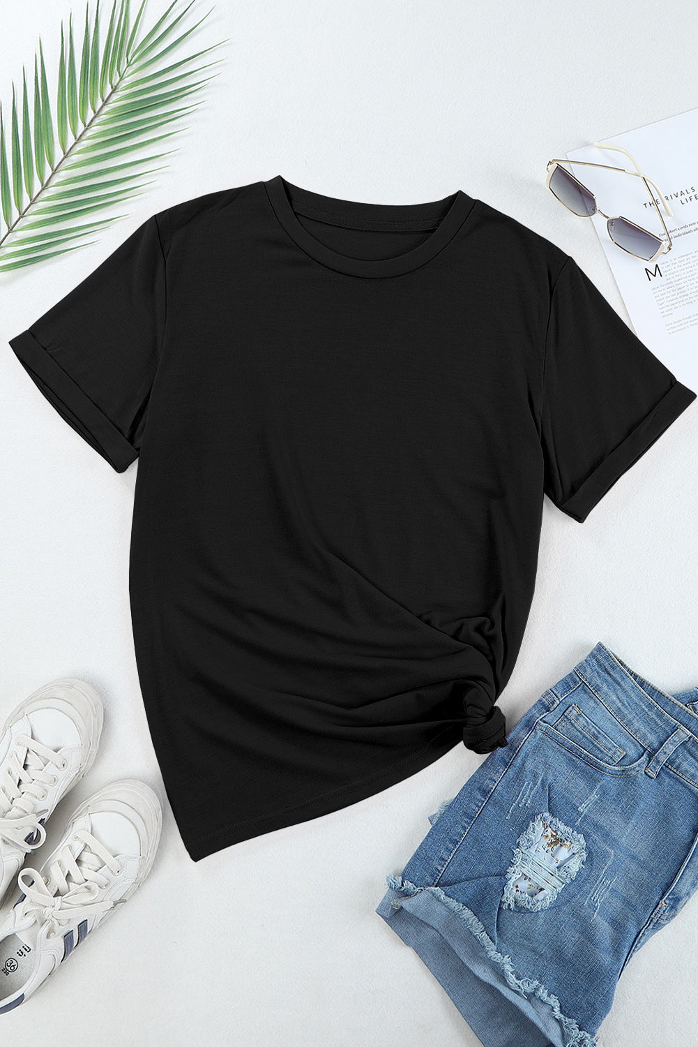 Camiseta negra relajada con placas redondas