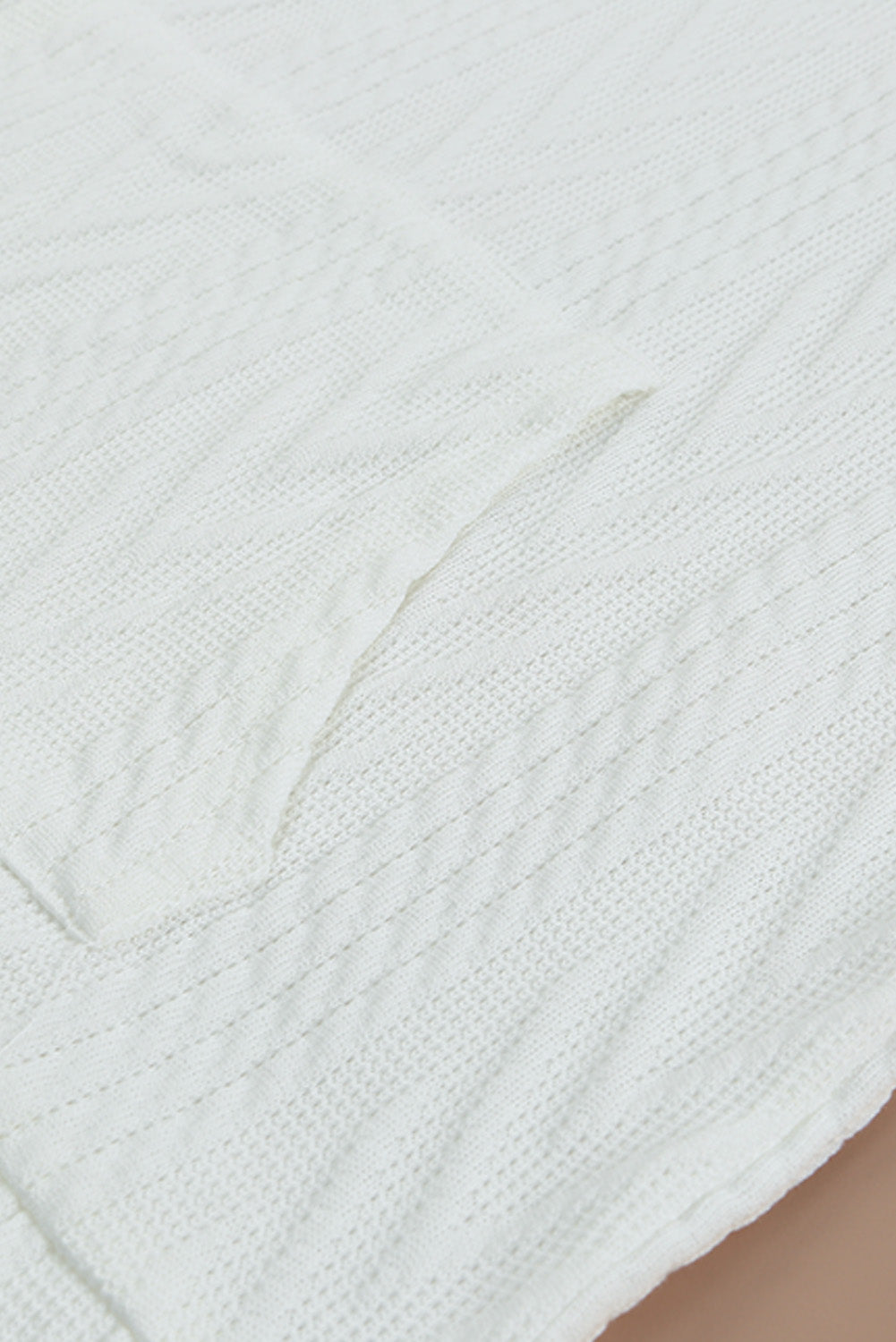 Sweat texturé au cou de cou de couche blanc