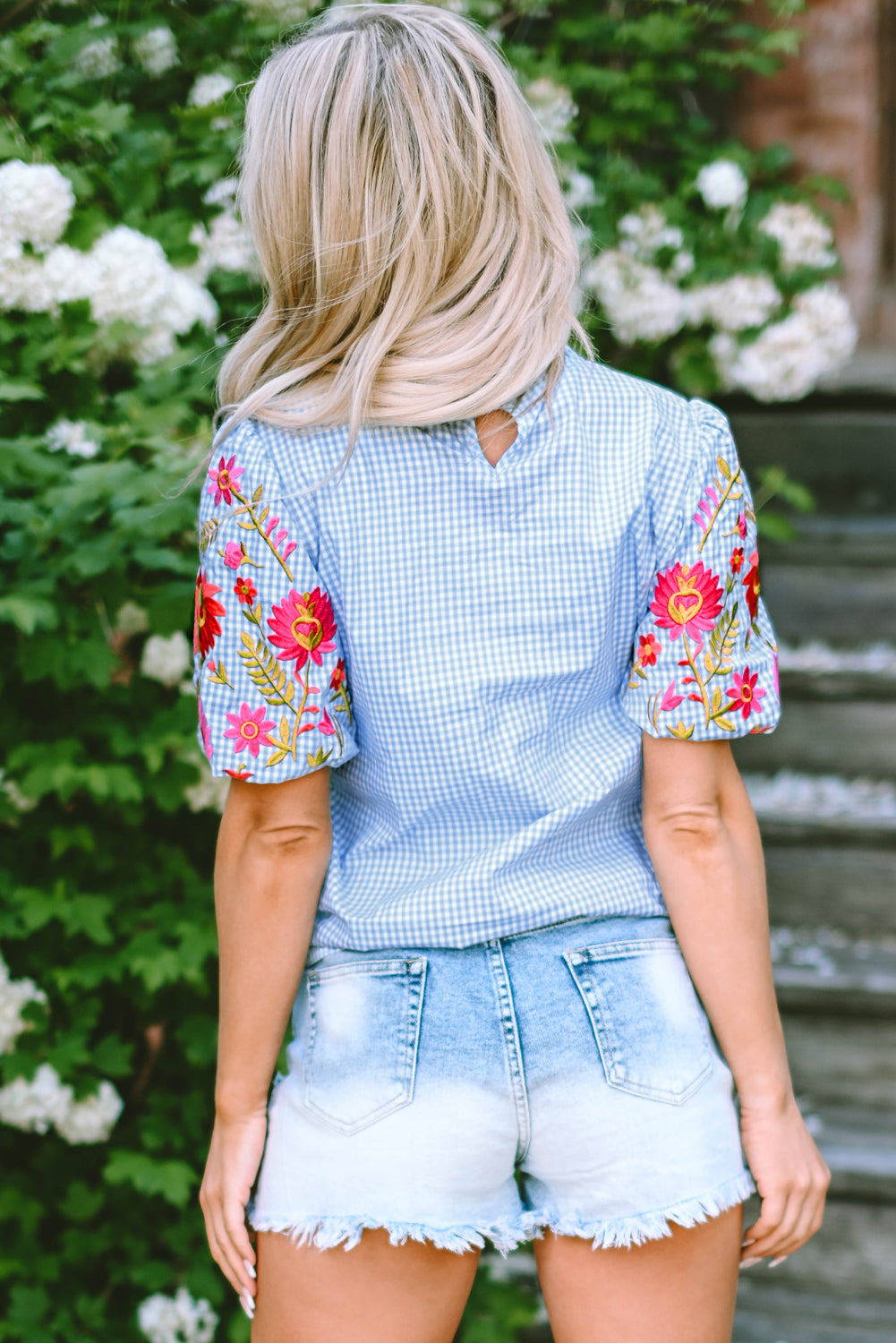 Hellblau Gingham Blumenbluse bestickte Puffhülle