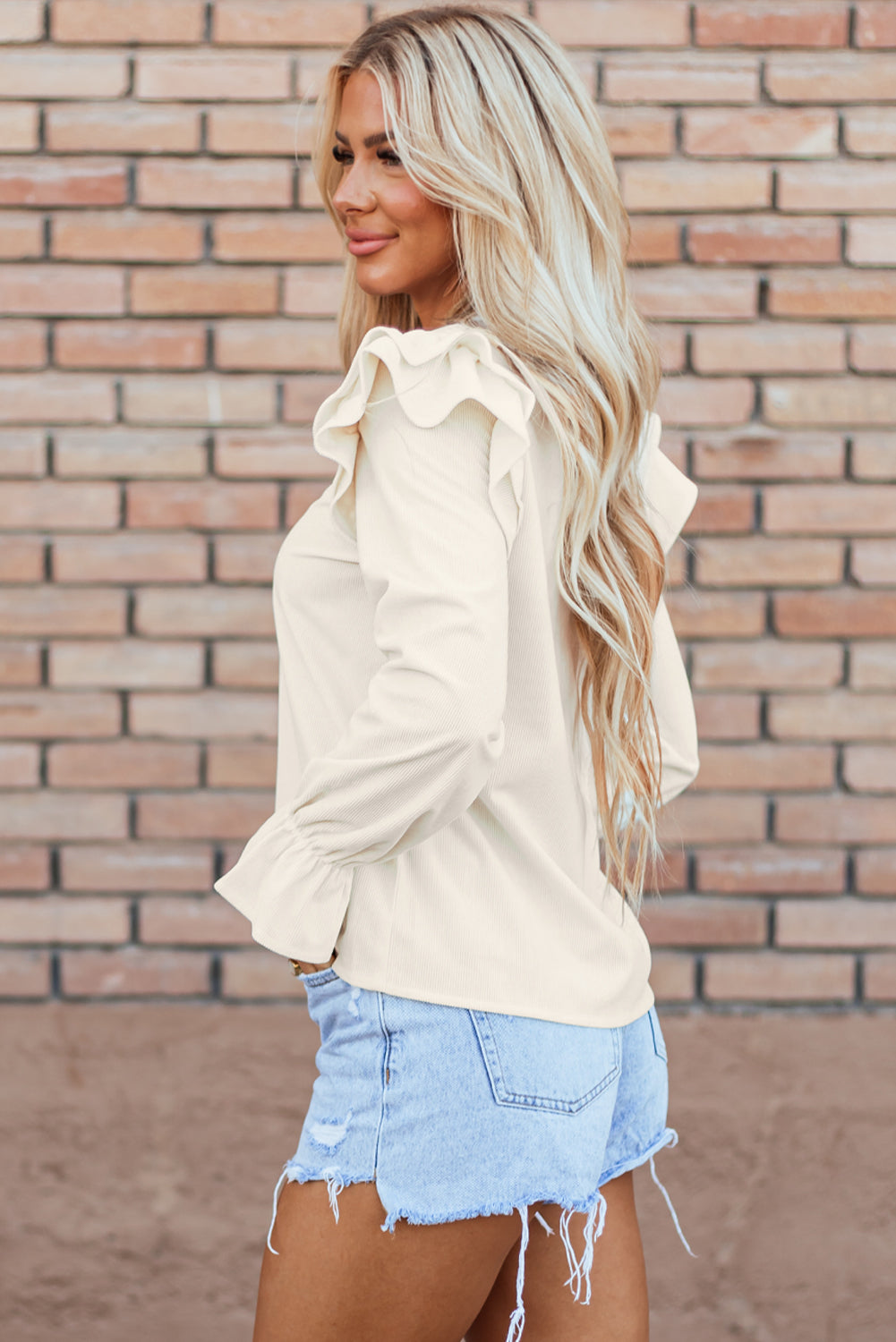 Beige gekräuselte Flockenhülle -Cordbluse