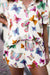 Short sleeve shirt set with multicolored butterfly pattern