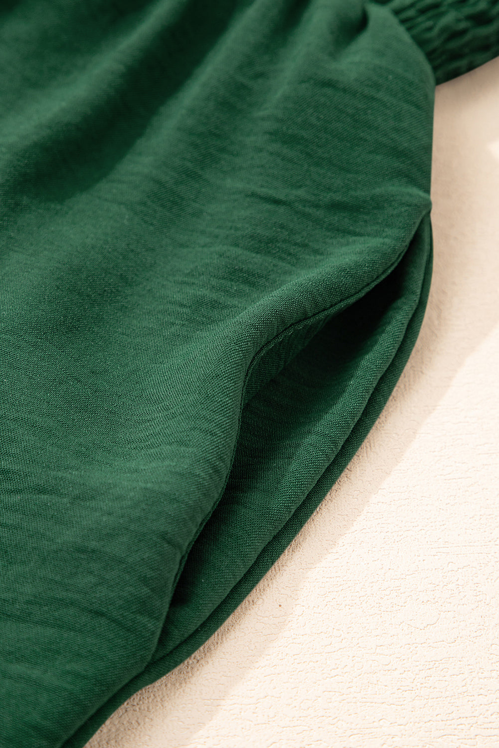 Combinaison verte smockée sans manches à jambe large avec poches