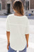 Ample white high in embossed knitting with drooping shoulders