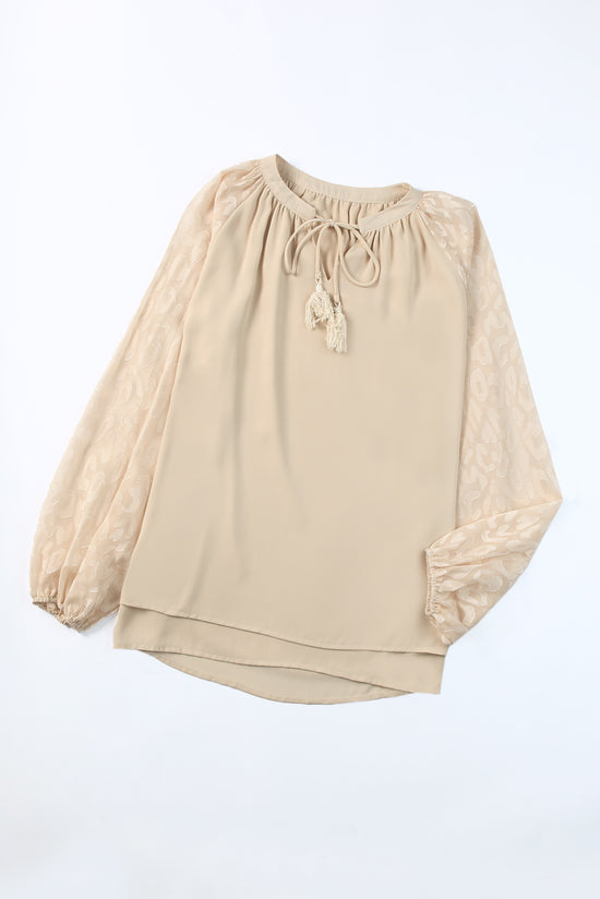 Beige blouse with split neck and puffy sleeves in leopard mesh