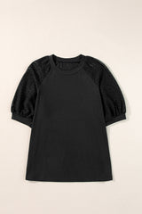 Camiseta negra con mangas a media larga y cuello de encaje redondo