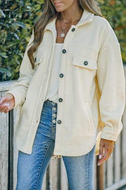 Beige button-down shirt jacket with turn-down collar