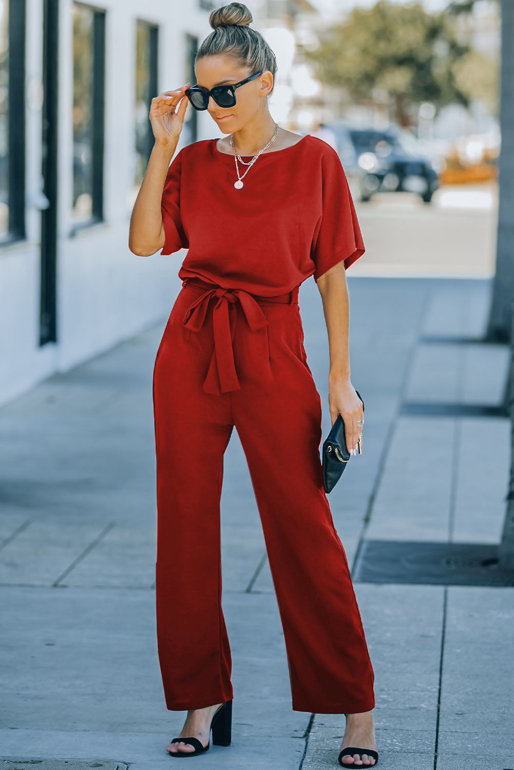 Bright red belted wide leg jumpsuit