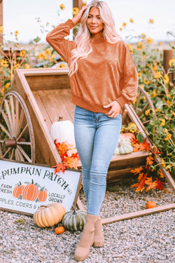 Orange sweatshirt with neck and drooping shoulders