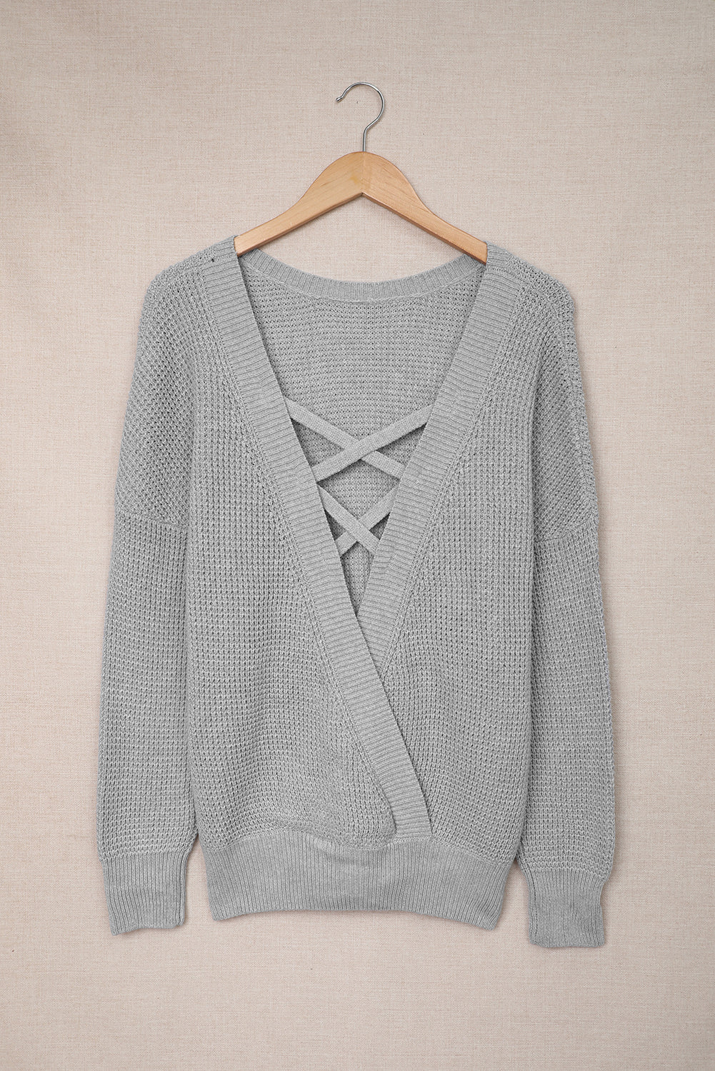 Gray haked sweater in the cross -back