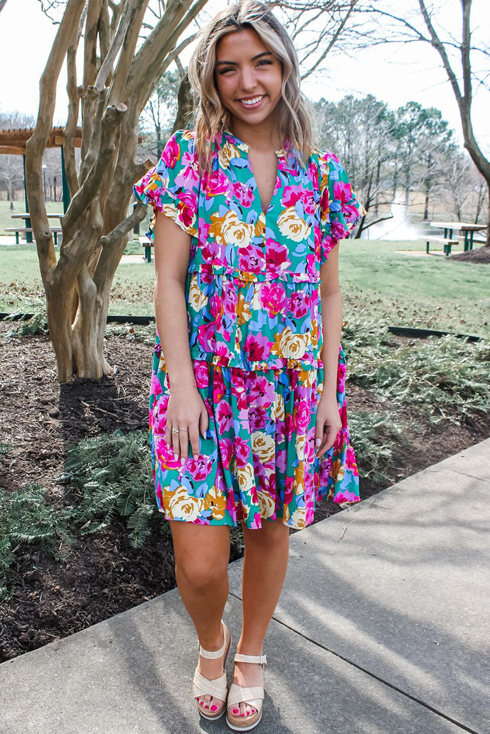 Short dress with ruffles and pink green floral print