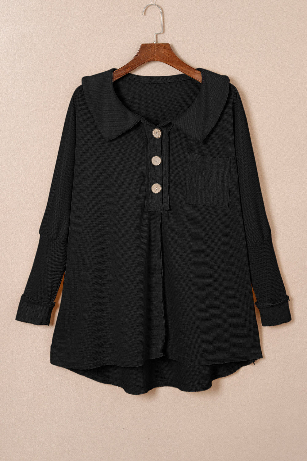 Long -sleeved buttoned button on black sprayed knitting