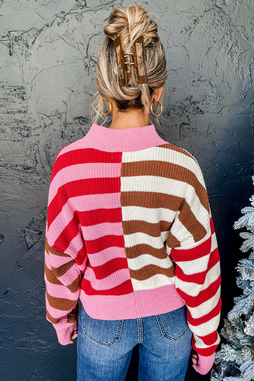 Loose-fitting striped color block sweater with high neck and dropped shoulders in pink