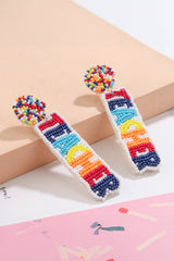 Boucles d'oreilles pendantes en perles de riz TEACHER blanches-A WOMAN WE LOVE