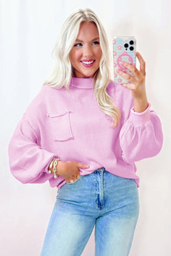 Pink shoulder pink sweater and ribbed details with raw edges