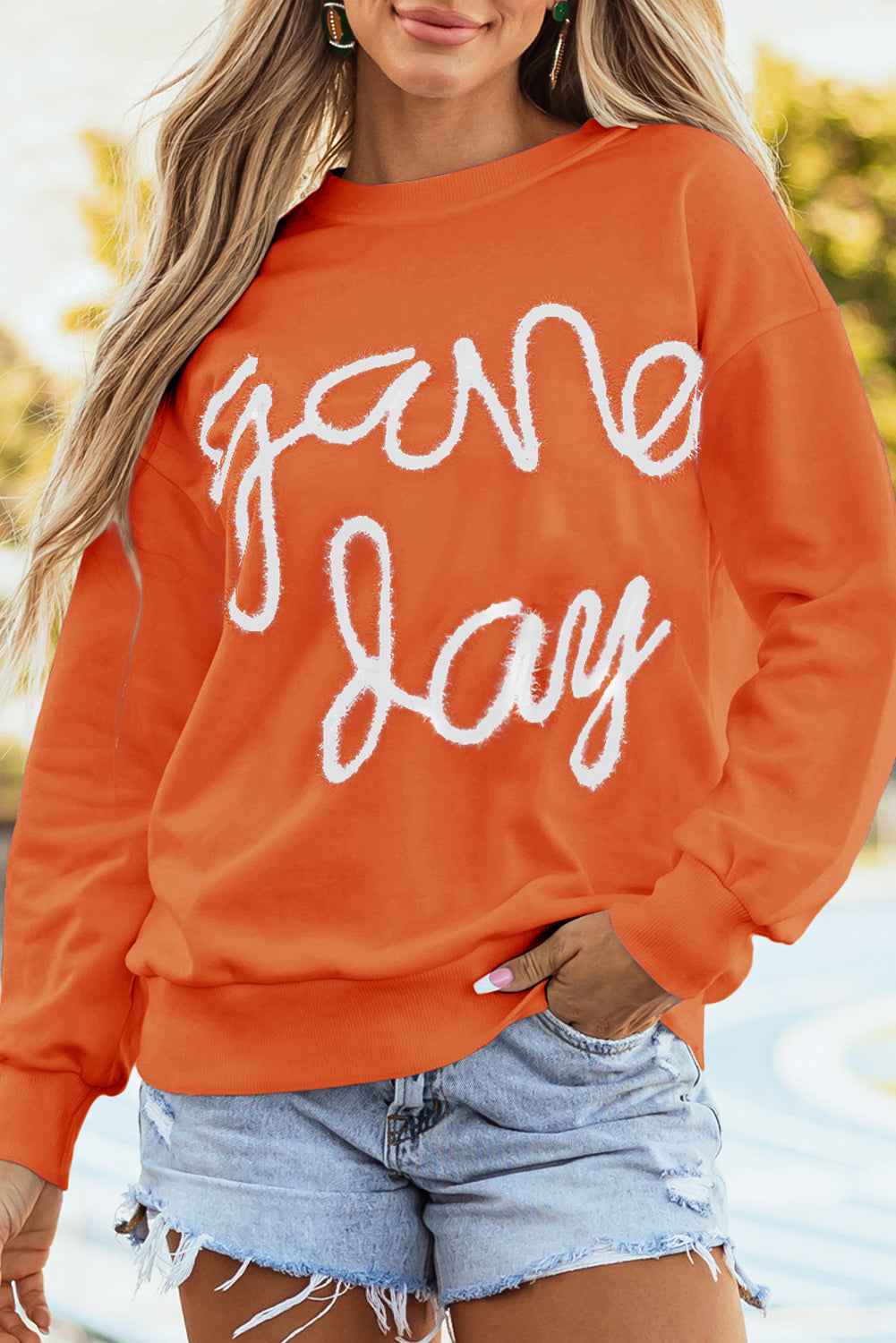 Sudadera gráfica de hombro caída y day de juegos de ruso naranja guirnaldas