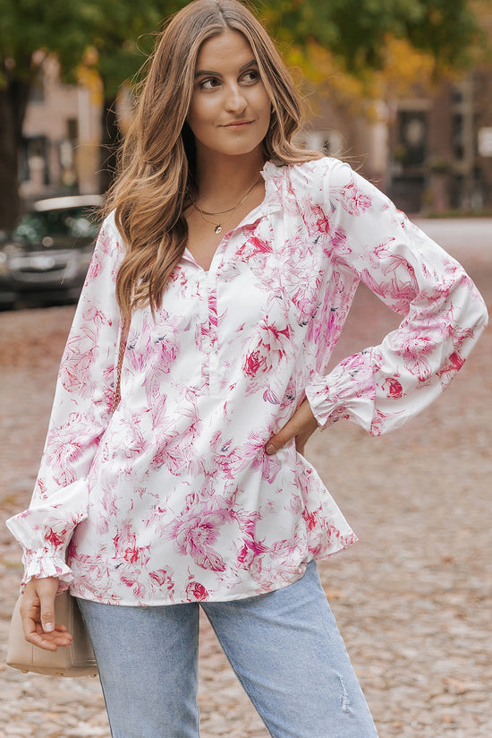 Multicolored blouse with vibrating floral print and ruffle border