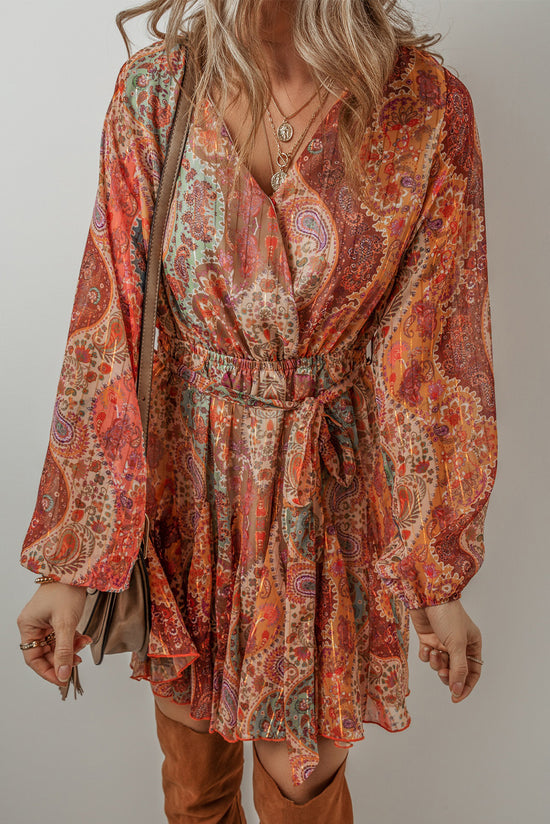 Orange bohemian paisley print mini dress with long sleeves and pleated belt