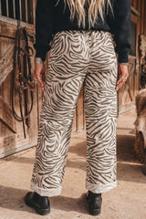 Pantalon beige zébré à taille élastiquée et cordon