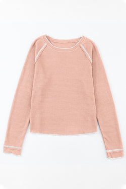 Long -sleeved textured high and apricot pink round pink neck *