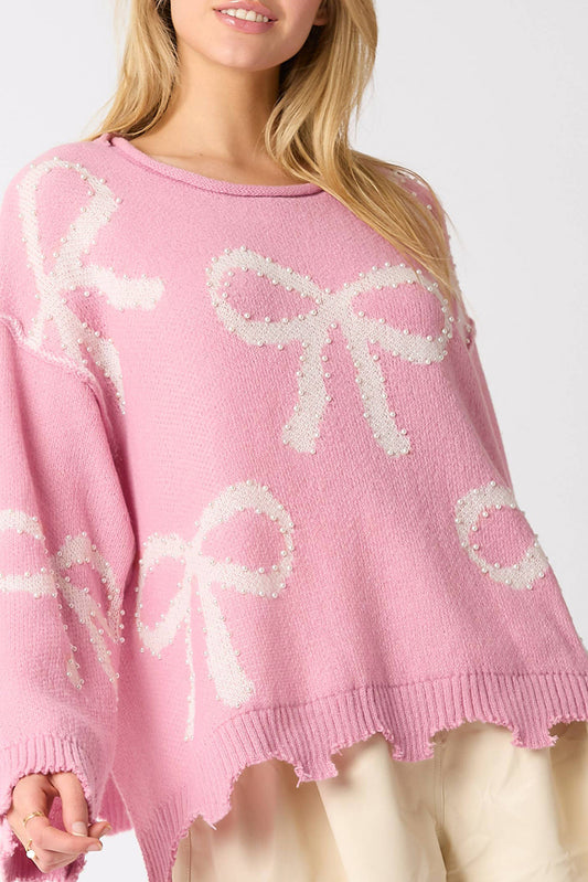 Pull à ourlet fendu en détresse à motif de nœud perlé rose