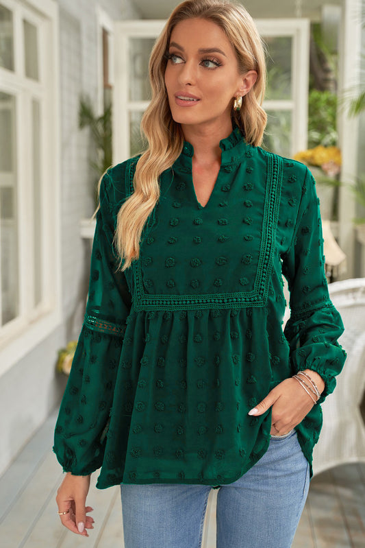 Ruffled blouse with openwork lace slit collar and green polka dot puff sleeves