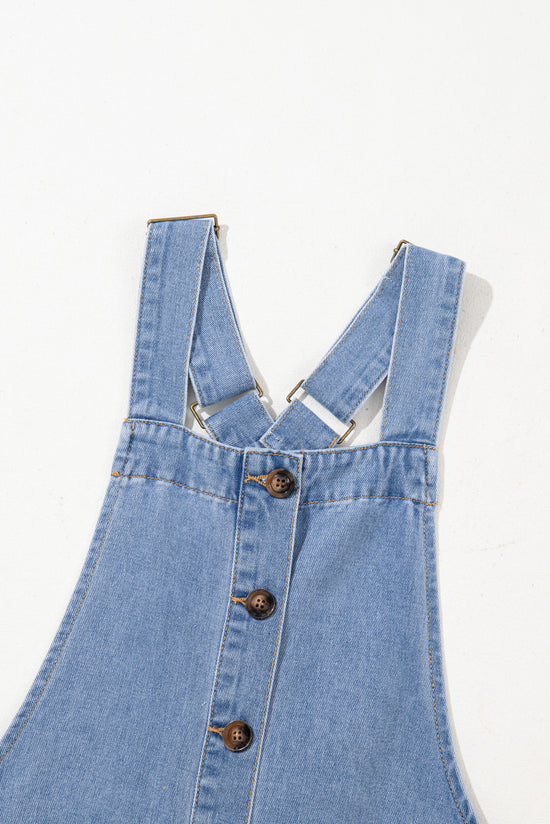 Short denim dress with wide suspenders *