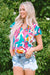 Multicolored blouse with abstract print and notched collar with floating sleeves