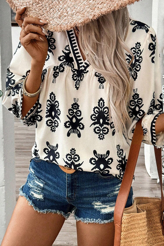 Blusa beige con impresión geométrica vintage *