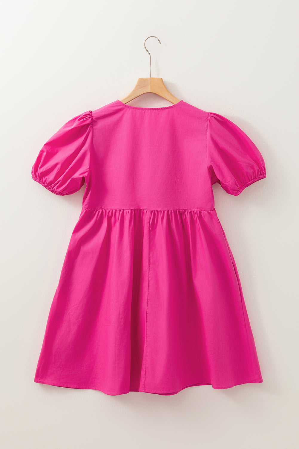 Mini-robe rose vif à manches bouffantes *
