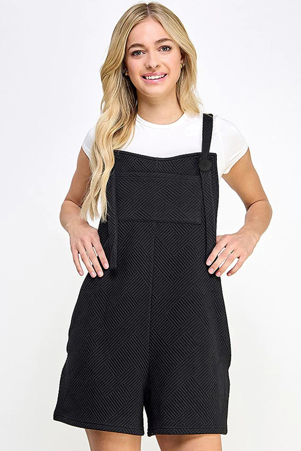 Black textured romper with adjustable straps