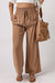 Large casual pants with elastic waist with brown tightening cord