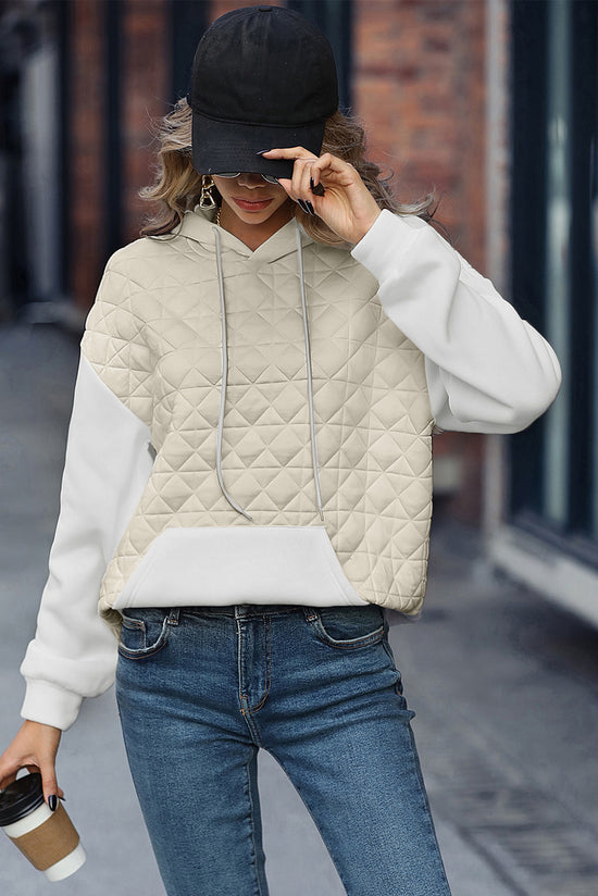 Beige hoodie with kangaroo pocket and quilted patchwork with dropped shoulders