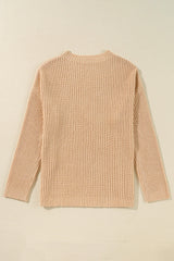 Pull ample en tricot torsadé abricot avec épaules tombantes et fentes latérales