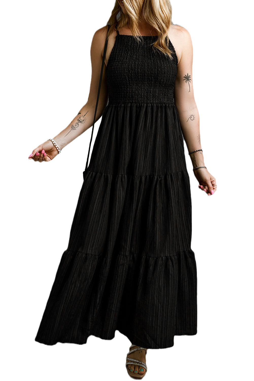 Black long dress with ruffles and spaghetti straps, smocked and pleated