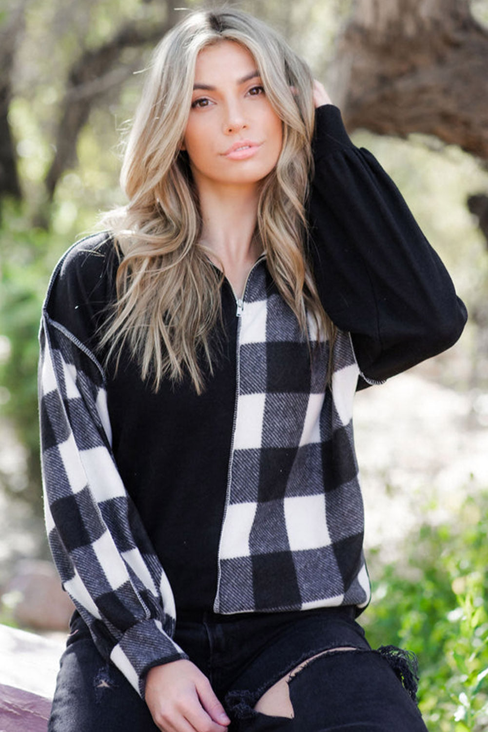 Black checkerboard patchwork collared top with exposed seams